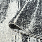 https://www.sarayrugs.com.au/wp-content/uploads/2023/08/Astor481Charcoal_Loop.jpg