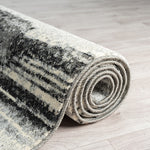 https://www.sarayrugs.com.au/wp-content/uploads/2023/08/Astor481Charcoal_Roll.jpg