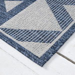 https://www.sarayrugs.com.au/wp-content/uploads/2025/07/Patio457Indigo_Angle.jpg