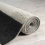 https://www.sarayrugs.com.au/wp-content/uploads/2023/08/Astor484Slate_Roll.jpg