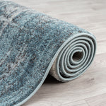 https://www.sarayrugs.com.au/wp-content/uploads/2023/08/Canyon516Blue_Roll.jpg
