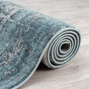 https://www.sarayrugs.com.au/wp-content/uploads/2023/08/Canyon516Blue_Roll.jpg