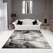 https://www.sarayrugs.com.au/wp-content/uploads/2021/11/Desire-9623-Black-Lounge.jpg