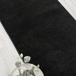 https://www.sarayrugs.com.au/wp-content/uploads/2025/09/Europa1000BlackRun_Accessory.jpg