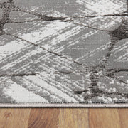 https://www.sarayrugs.com.au/wp-content/uploads/2019/05/Lotus-2694-Grey-Thickness.jpg