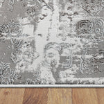 https://www.sarayrugs.com.au/wp-content/uploads/2019/05/Lotus-2729-Lt-Grey-Thickness.jpg