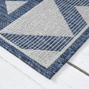 https://www.sarayrugs.com.au/wp-content/uploads/2025/07/Patio457Indigo_Angle.jpg